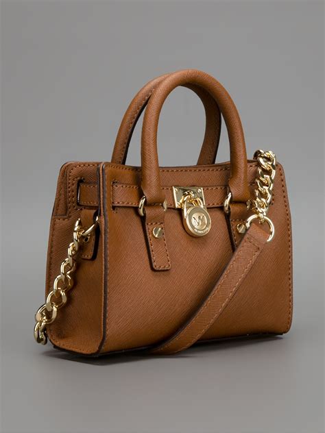 michael kors purse light brown leather|Michael Kors handbags dark brown.